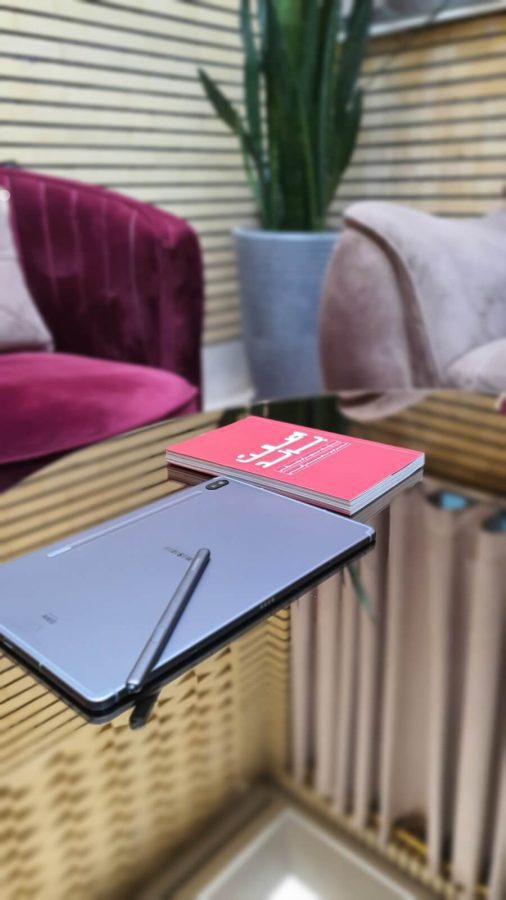 tablet and book